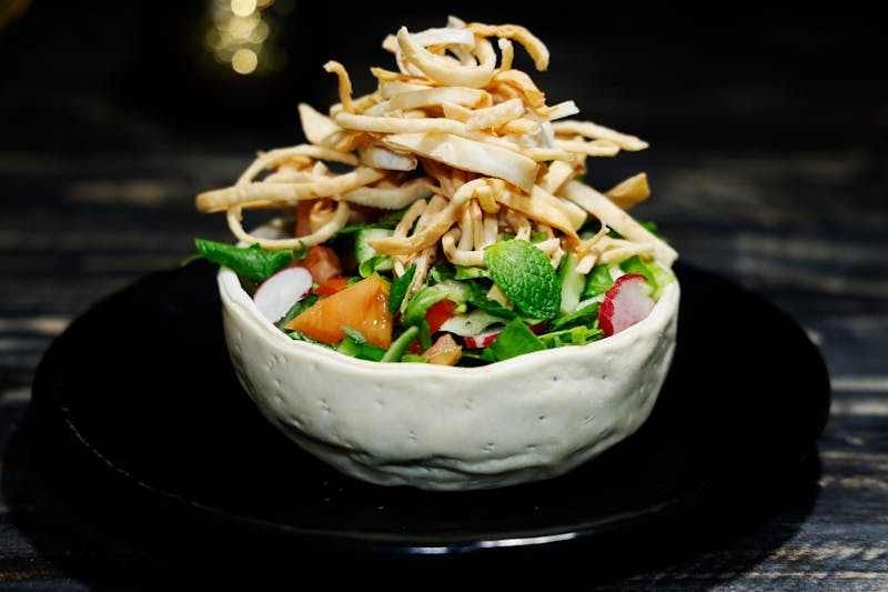 Sweet pork salad with tortilla strips